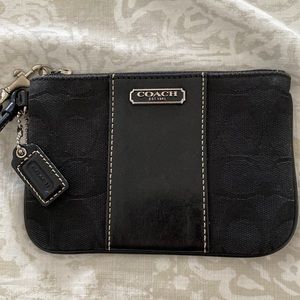 Coach signature canvas leather zip top wristlet